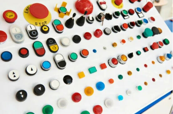 manufacturing device push button